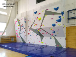 Climbing walls that are located in school gymnasiums, on school buildings, or other similar premises.